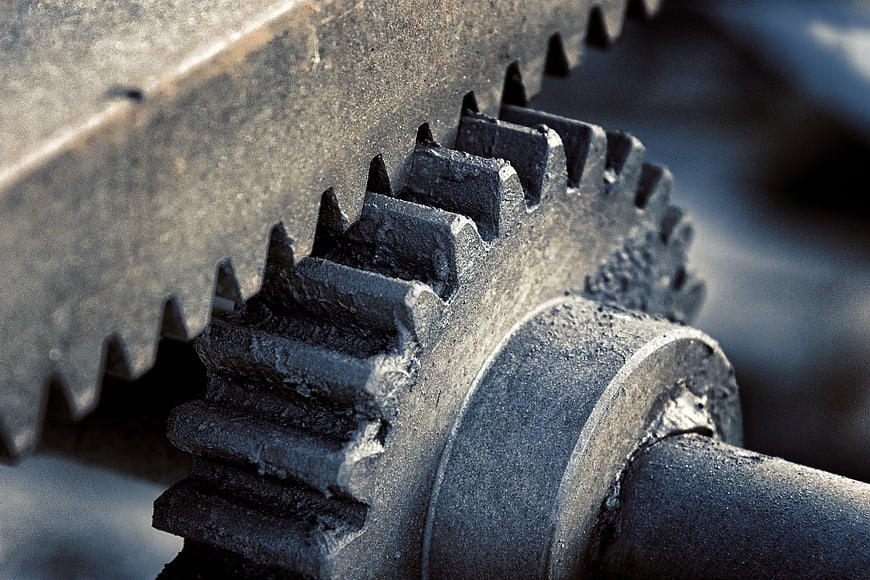 Close-up of old rusted metal gears and mechanical transmission parts