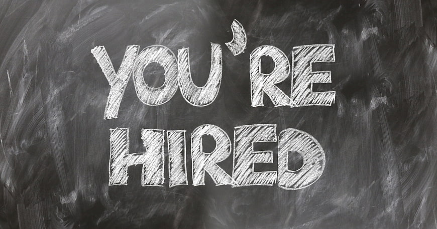 You're Hired Chalkboard Text for Employment and Job Success