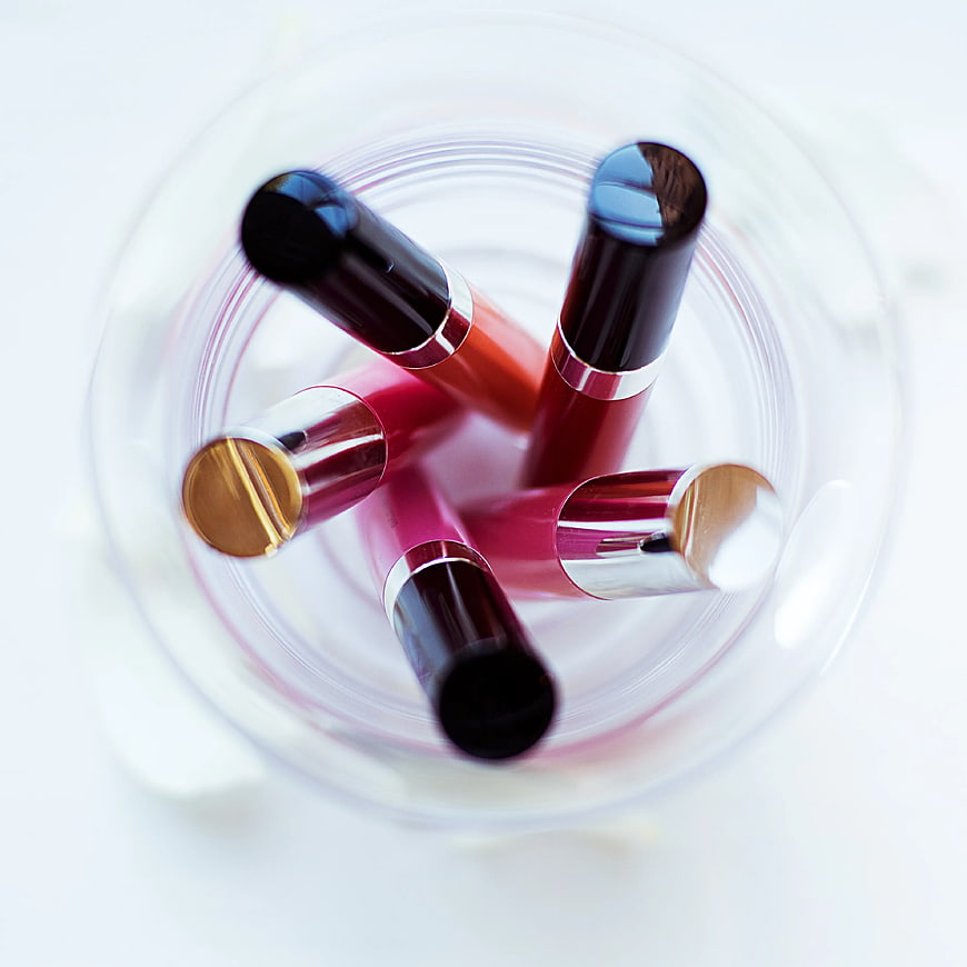 Top View of Assorted Liquid Lipsticks in Glass Jar