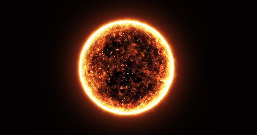 Glowing fiery sun sphere on black background