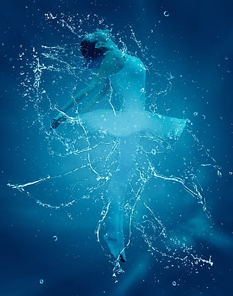 Underwater ballerina in white tutu with water splashes