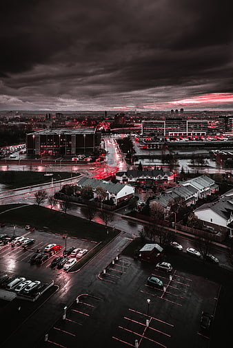 Dramatic Urban Cityscape at Dusk with Red Light Trails