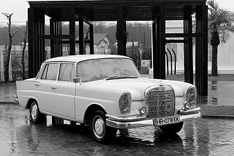 Vintage White Mercedes-Benz W120 in Rain