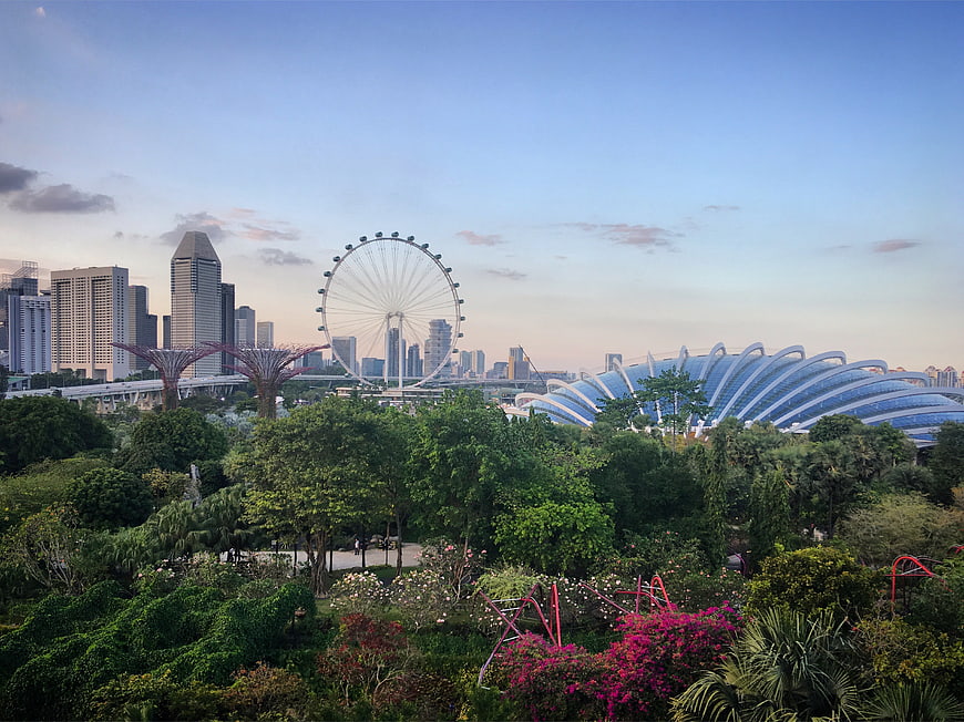Singapore skyline with Gardens by the Bay and Ferris wheel