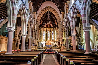 Interior of Gothic Church with Arches and Pews