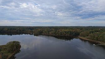 Aerial View of Serene River and Autumn Forest Landscape