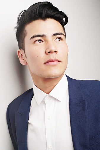 Portrait of Handsome Man in Blue Suit Looking Up