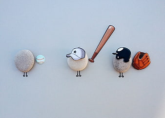 Creative Baseball Stone Art with Enamel Pins on Gray Background