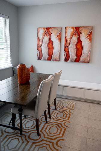 Modern Dining Room with Rustic Table and Abstract Art