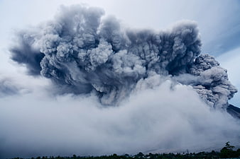 Massive Volcanic Eruption Ash Cloud Rising into Sky