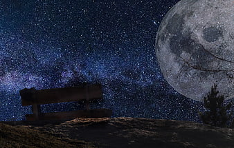 Wooden Bench Under Starry Night Sky With Giant Moon