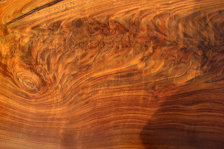 Rich Mahogany Wood Grain Texture with Swirls