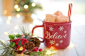 Red Believe Mug With Hot Cocoa, Marshmallows, And Christmas Decor