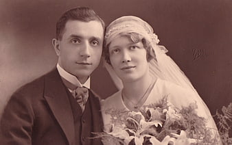 Vintage Sepia Wedding Portrait of a Couple with Bridal Bouquet
