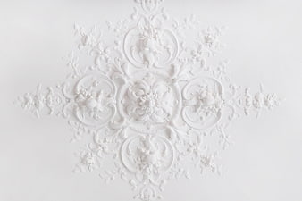 White Ornate Stucco Ceiling Molding Detail