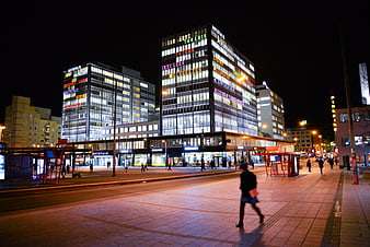 Night cityscape of Kamppi Helsinki with illuminated office buildings