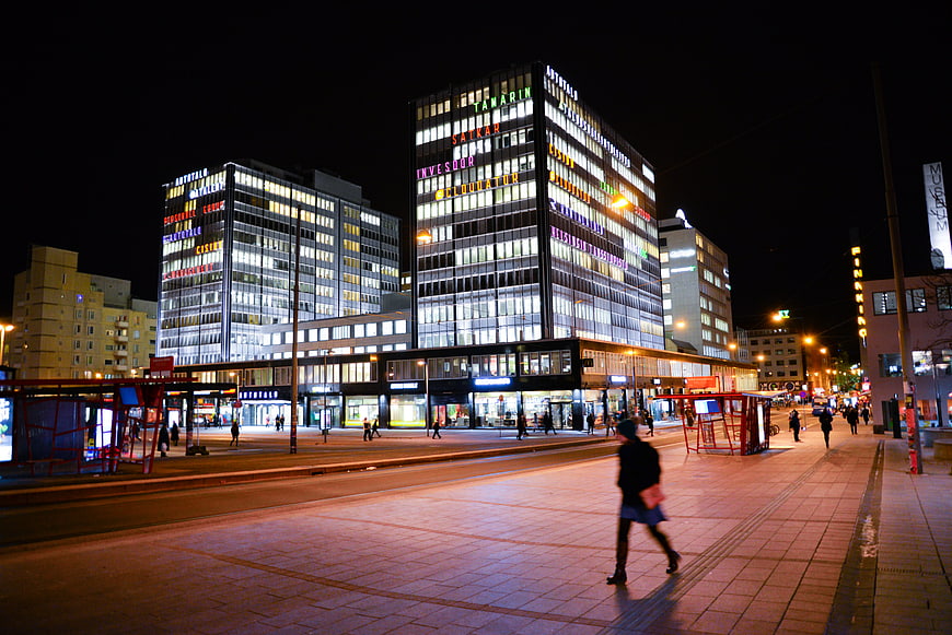 Night cityscape of Kamppi Helsinki with illuminated office buildings