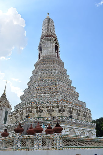 Ornate Thai Temple Pagoda Against Blue Sky