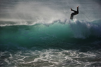 Surfer Wipeout on Powerful Ocean Wave