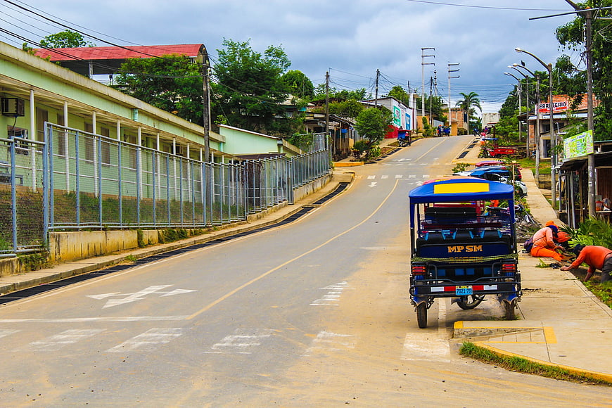 Blue Moto-taxi Parked on Quiet Street in Brazilian Town