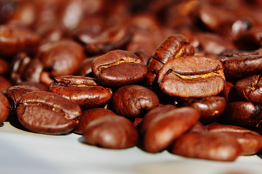 Close-up of roasted coffee beans with shallow depth of field