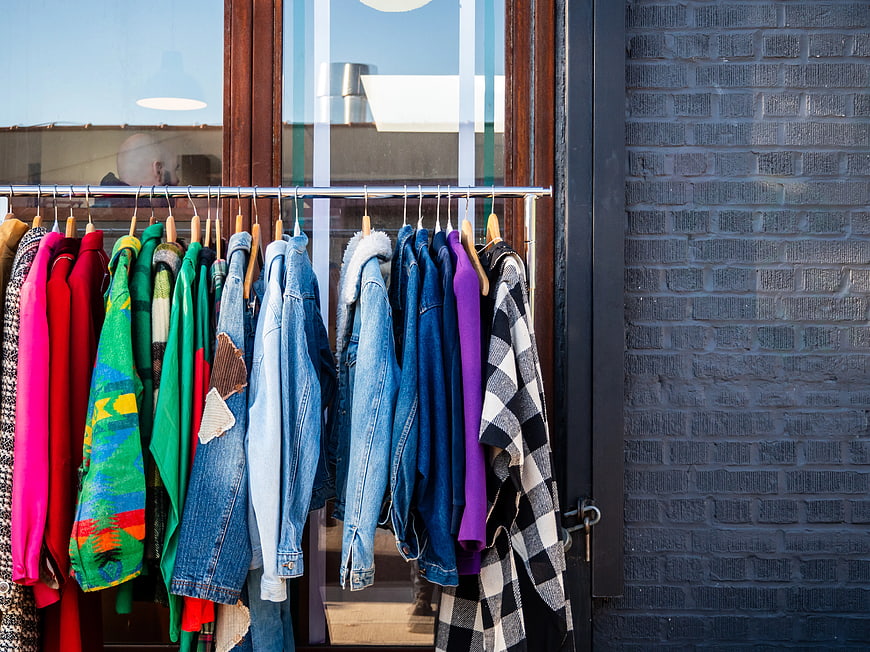 Colorful Clothing Rack Outside Boutique Store Window