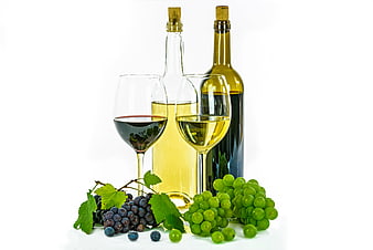 Red and White Wine Bottles with Grapes on White Background