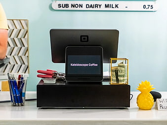 Square Register at Modern Coffee Shop Counter