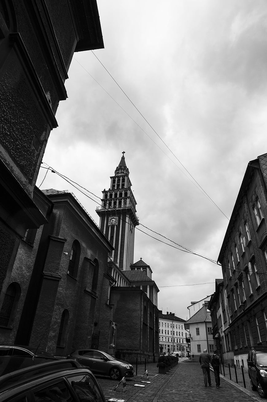 Black and white street view of Bielsko-Biała church tower