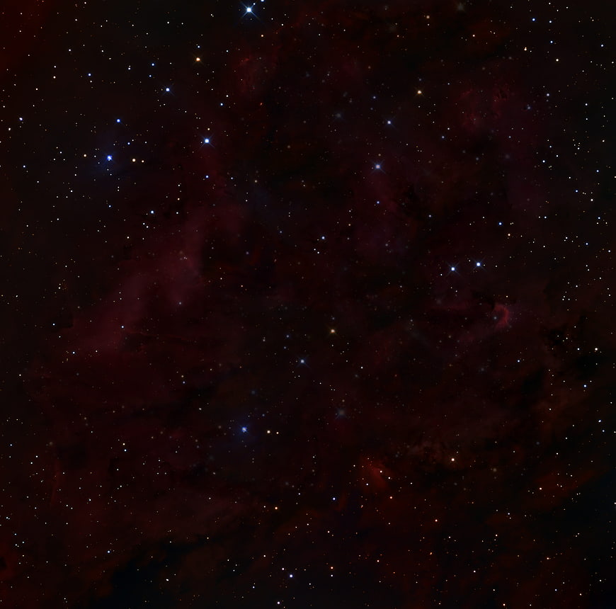 Deep Space Star Field With Red Nebulae And Bright Stars