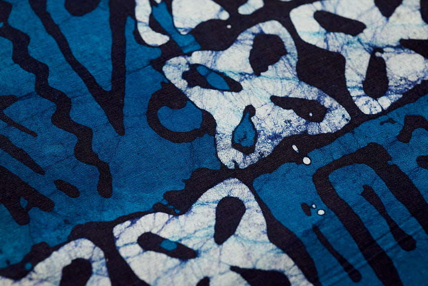 Close-up of blue and white abstract batik fabric texture