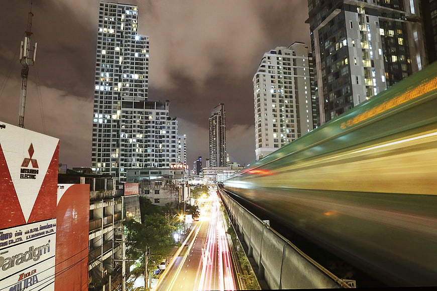 Long Exposure Night Cityscape with Blurred Train and Traffic