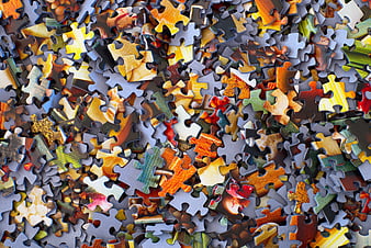Scattered Jigsaw Puzzle Pieces Background