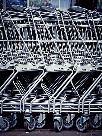 Row of Nested Metal Shopping Carts Outside Store
