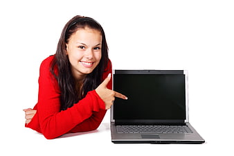 Young Woman in Red Pointing at Laptop Screen