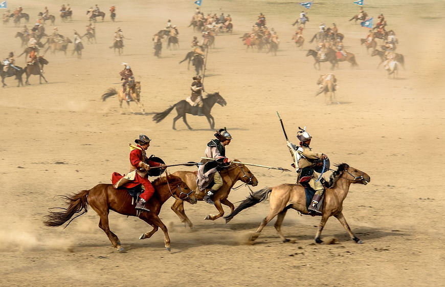 Mongolian Horsemen in Traditional Battle Reenactment