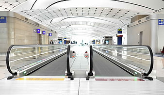 Modern Airport Moving Walkways with Arched Ceiling