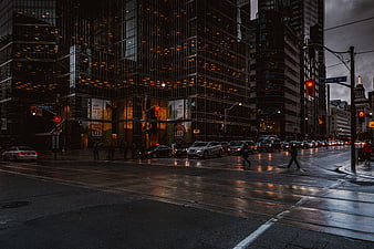 Rainy City Street at Dusk with Reflections