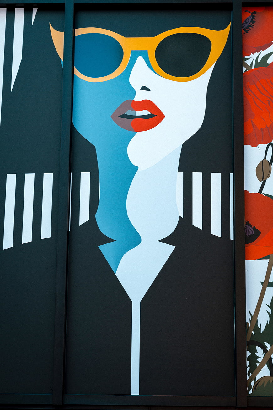 Pop Art Portrait of Woman with Sunglasses on Wall