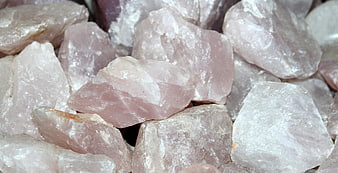 Raw Rose Quartz Crystal Rocks Close Up