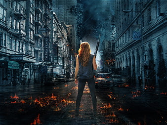 Woman with Shotgun in Post-Apocalyptic Burning City Street