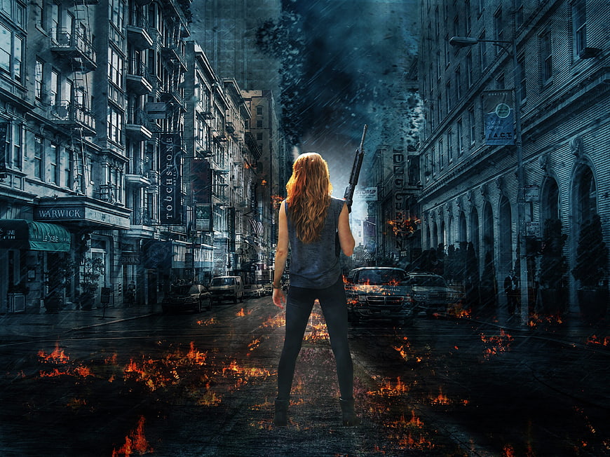 Woman with Shotgun in Post-Apocalyptic Burning City Street