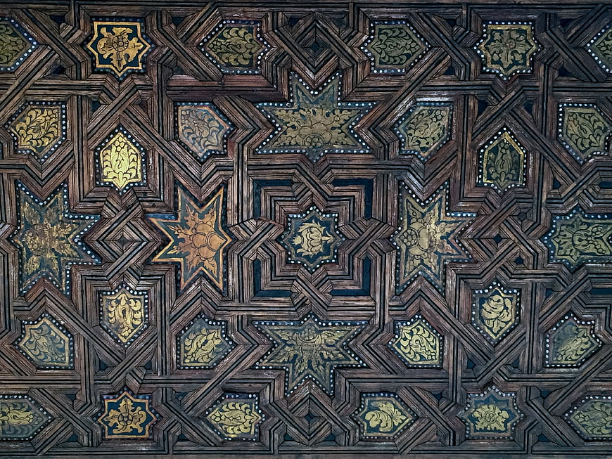 Intricate Moorish wooden ceiling pattern with geometric stars
