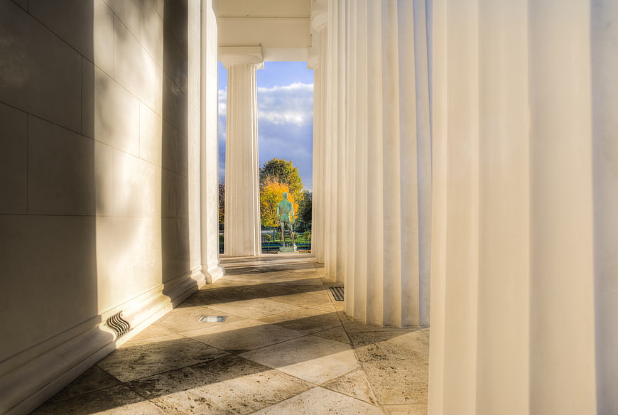 Classical Columns and Statue in Volksgarten Vienna