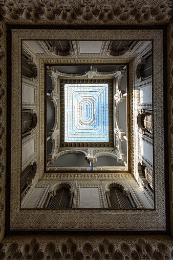 Looking Up At The Intricate Courtyard Ceiling Of The Alcazar In Seville