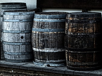Weathered Wooden Barrels in Rustic Storage Setting
