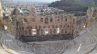 Ancient Greek Theater Ruins With City View