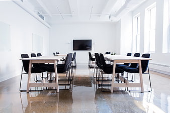 Modern minimalist conference room with polished concrete floors