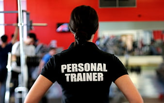 Personal Trainer Back View in Gym