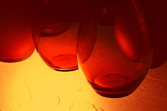 Close-up of amber glass bottles with warm lighting